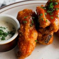 Sweet + Spicy Wings · calabrian chile agrodolce + spring onion ranch. Contains gluten cross-contamination, not glu...