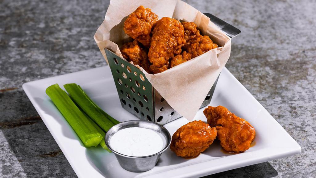 Boneless Wings · Hand-tossed in choice of sauce: house BBQ, buffalo, honey-chipotle. Served with celery and dipping sauce. 1020-1200 cal.
