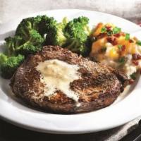 Classic Ribeye · Favorite. Marbled, thick-cut steak topped with garlic butter. 630 cal.