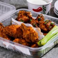 Bone-In Wings (16Ct) · Served with fresh celery and choice of ranch or bleu cheese on the side. Choose up to two fl...