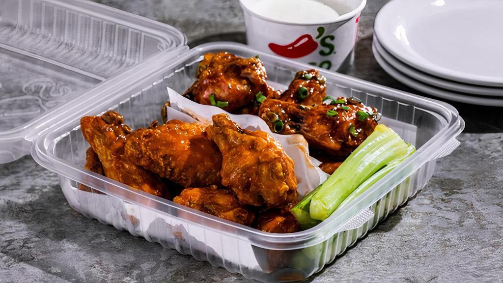 Bone-In Wings (16Ct) · Served with fresh celery and choice of ranch or bleu cheese on the side. Choose up to two flavors. Serves four. 1690-2310 cal.
