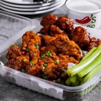 Boneless Wings (33Ct) · Served with fresh celery and choice of ranch or bleu cheese on the side. Choose up to three ...