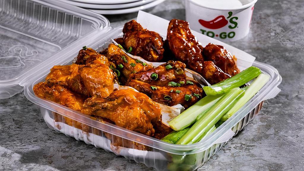Bone-In Wings (24Ct) · Served with fresh celery and choice of ranch or bleu cheese on the side. Choose up to three flavors. Serves six. 2310-3130 cal.