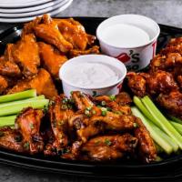 Bone-In Wings (48Ct) · Served with fresh celery and choice of ranch or bleu cheese on the side. Choose up to three ...