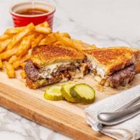 Patty Melt · Hamburger with sautéed onions and melted swiss cheese on grilled rye bread.