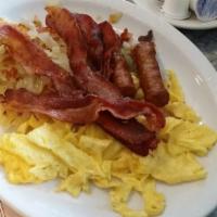 2 Eggs (Any Style) · Served with your choice of: Ham, bacon, sausage, pork roll, or scrapple. Served with toast a...