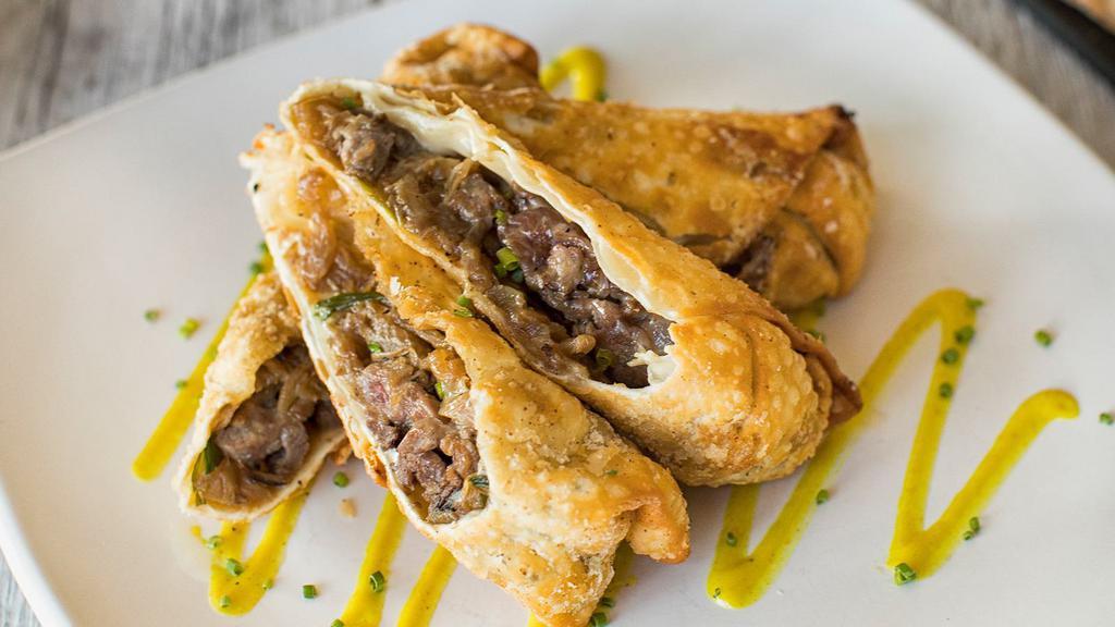 Cheese Steak Egg Rolls · thinly sliced sirloin, caramelized onions and cheese in a crispy egg roll wrapper with spicy mustard.