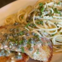 Chicken Piccata · lightly breaded and pan-seared in a lemony cream sauce with linguini and capers.