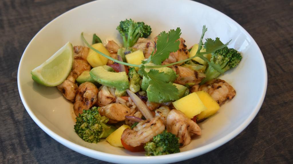 Chicken & Shrimp Rice Bowl · stir fried veggies tossed in a soy-ginger-garlic sauce over rice with mushrooms, mango, avocado, broccoli and toasted sesame seeds.