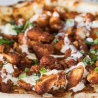 Buffalo Chicken · crispy chicken tenders tossed in our mango-buffalo bbq sauce with mozzarella, scallions and ...