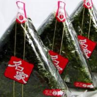 Onigiri 饭团 · Special seasoned steamed rice filled with choice of protein formed into a  triangular shape ...