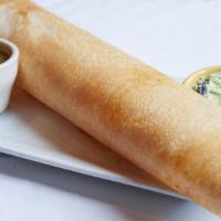 Chicken Dosa · Stuffed with barbecued chicken and potatoes. Served with coconut chutney and sambar (lentil ...