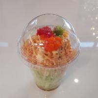Kani Salad · Cucumber and spicy krab mixed with our ponzu and spicy mayo sauce. Topped with masago, topik...