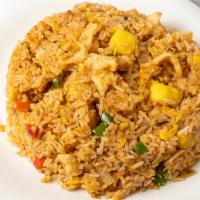 Pineapple Fried Rice · Pineapple, egg, onion, green and red pepper. Mildly spicy.