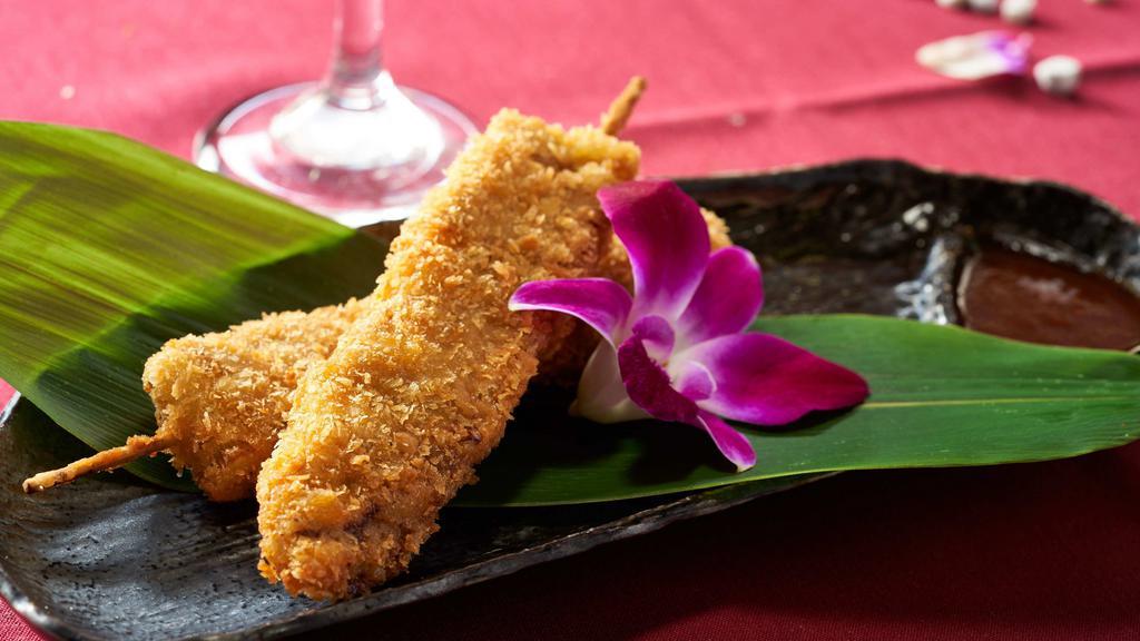 Kushi Katsu · Two skewers of cubed meat or fresh seafood deep-fried in bread crumb batter served with sweet and sour fruit sauce.