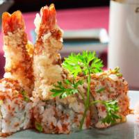Shrimp Tempura Maki · Inside shrimp tempura; outside tobiko, scallion and eel sauce.