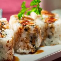 Idaho Maki · Inside sweet potato tempura; outside eel sauce.