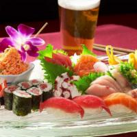 Fugakyu Boat · Chef's choice of assorted sushi and sashimi.