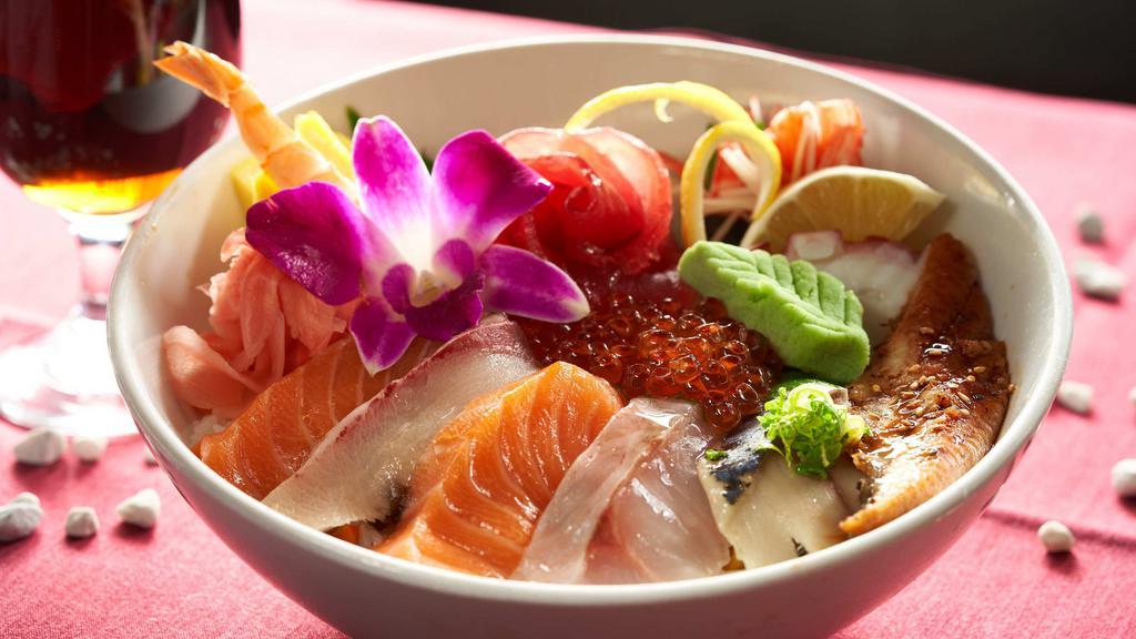 Chirashi · Chef's choice of assorted sashimi over a bed of seasoned rice.