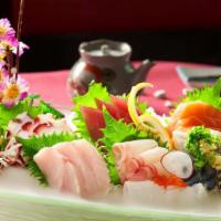 Sashimi Combo · Assorted filets of raw fish, served with rice.