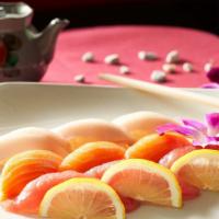 Sushi Three Kinds · Tuna sushi, salmon sushi and yellowtail sushi.
