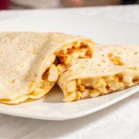 Quesadillas · A large flour tortilla with cheese and a choice of meat and also comes with onion and cilant...