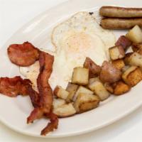 The Big Two · 2 Eggs, 2 Bacon, 2 Sausage, Home Fries or Beans & Toast, and a Choice of 2 Buttermilk Pancak...