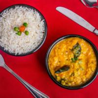 Dal Tadka · Vegan, gluten free. Yellow lentils cooked with onion, tomato, butter, and spices.