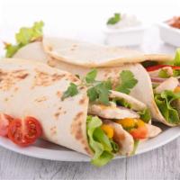 Ranchero Wrap · Juicy grilled chicken with cheddar cheese, jalapeños, pico de gallo and ranch dressing.