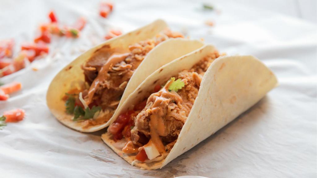 Chipotle Chicken Wrap · Grilled chicken with peppers, onions, cilantro, avocado and chipotle.
