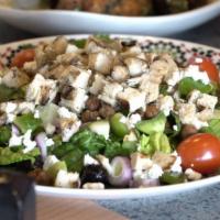Paprika’S Chicken Chopped Salad · Chopped Romaine, goat cheese, roasted chickpeas, tomatoes, cucumbers, red onions, fresh pepp...