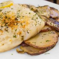 Baked Haddock · Flaky fish topped with breadcrumbs and a lemon Garlic sauce, served with roasted potatoes.