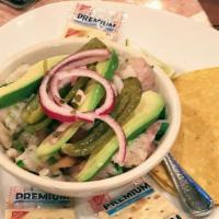 Fish Ceviche · The authentic Mexican ceviche, fish and lime juice served with jalapeños, onions and fresh c...