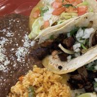 Tacos Vegetarianos · Choice of corn or flour tortillas filled with seasonal vegetables, bell peppers, onion, rice...