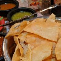 Chips & Salsa · Home make corn tortilla chips with chunky home make sauce