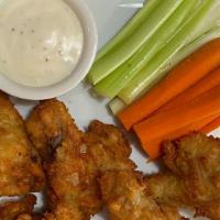 Buffalo Wings · Six count chicken wings served with carrot celery sticks and dipping sauce