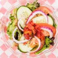 Phat Daddy'S House Salad · Roman lettuce tomato cucumbers onions and cheese choices of dressing