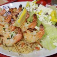 Shrimp Skewers · Served with rice, salad, and hot side dish.