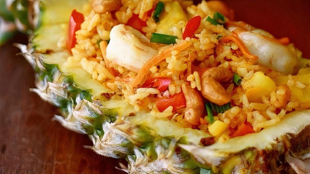Pineapple Fried Rice · Choice of chicken, beef, or pork.