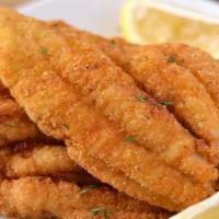 Fried Catfish (2Pc) · Crispy fried catfish fillet, served with two side dishes and bread on the side. We fry in pr...