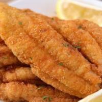 Fried Catfish Fillet (2Pc) · Crispy fried catfish fillet, served with bread on the side. We fry in premium canola oil.