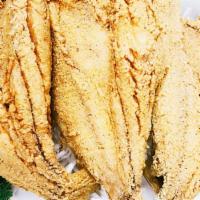 Fried Croaker · Crispy Fried bonefish, croaker. Served with two side dishes and choice of bread on the side....
