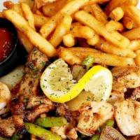 Shrimp Chicken Kabob Dinner · peeled shrimp, free-range grilled chicken, broccoli , fire roasted peppers, onion, fries
