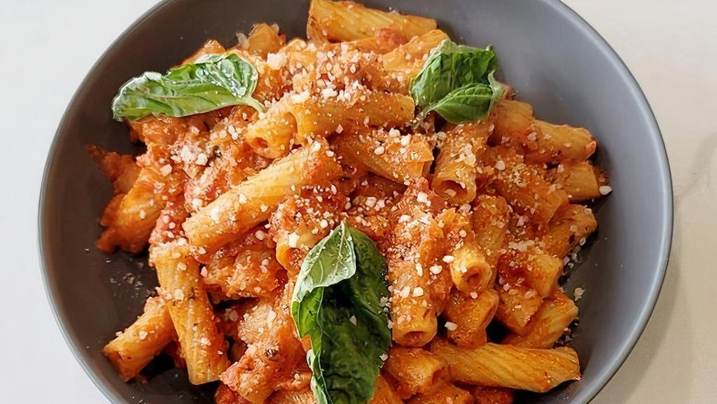 Pasta Ala Vodka · rich creamy tomato sauce infused with vodka tossed with rigatoni, pecorino romano, basil (proteins are extra add ons)