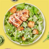 Chicken Caesar Salad · Romaine lettuce, grilled chicken, house croutons, and parmesan cheese tossed with caesar dre...
