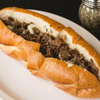 Cheesesteak Sandwich  · With American cheese.