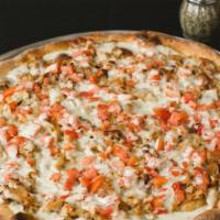 Chicken Bacon Ranch Pizza  · With tomatoes.