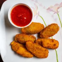 Jalapeno Poppers  · Choice of cheddar or cream cheese to stuff the jalapeno.