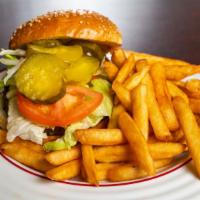 Cheeseburger Deluxe · With fries, lettuce, tomatoes, onions, and pickles.