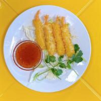 Fried Fantail Shrimp · 4 pieces. Crispy fried shrimp served with traditional sweet chili sauce
